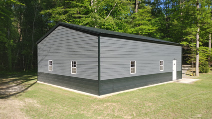 30' wide, 40' long, 12' tall metal garage with vertical metal roof and horizontal siding